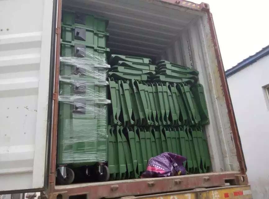 product-380-317 dustbin loading in container.jpg